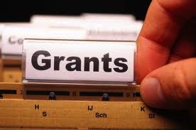 Image - Grants (shown as a file in a filing cabinet labeled "Grants")